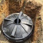 Balance tank set in concrete